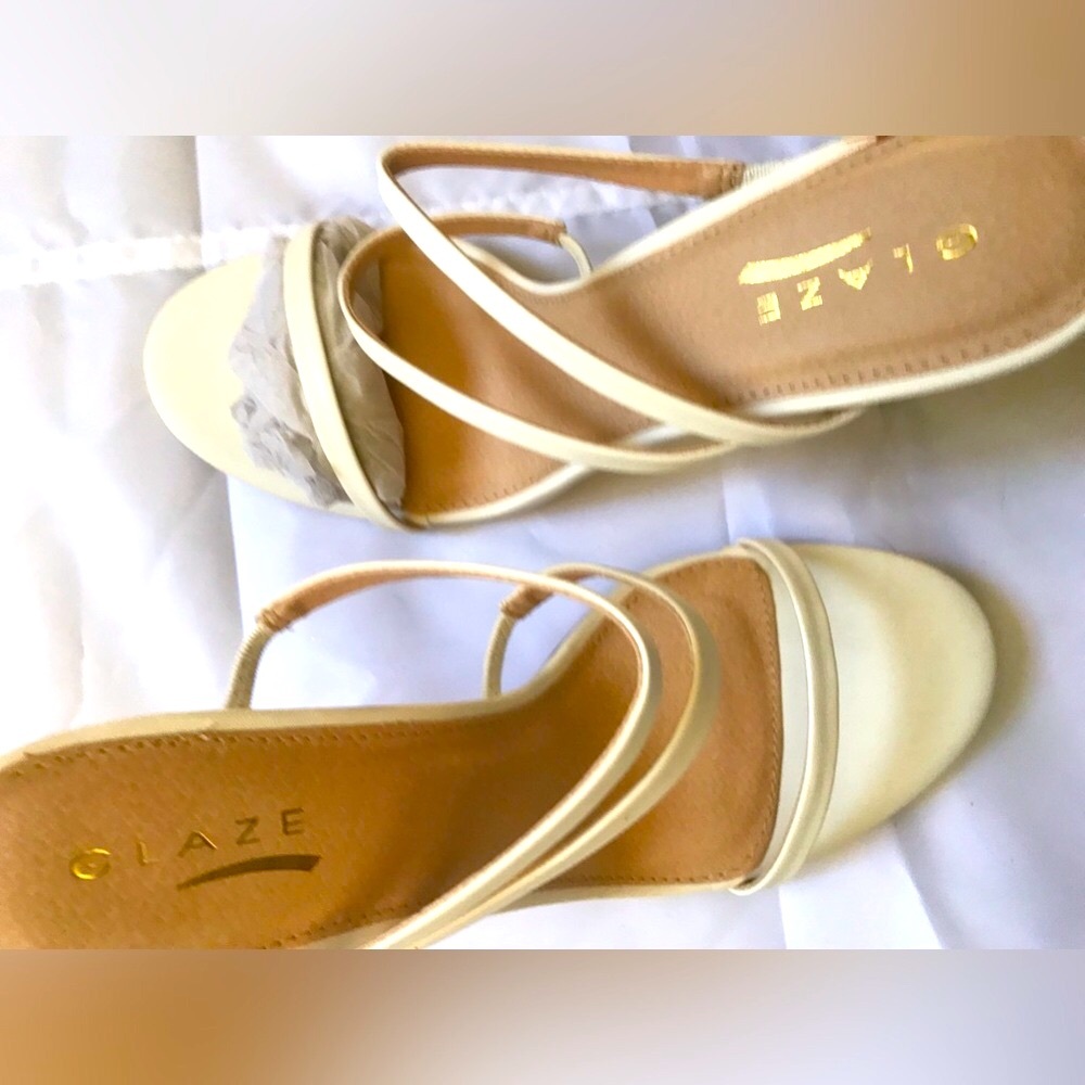 Glaze white high heels mules.